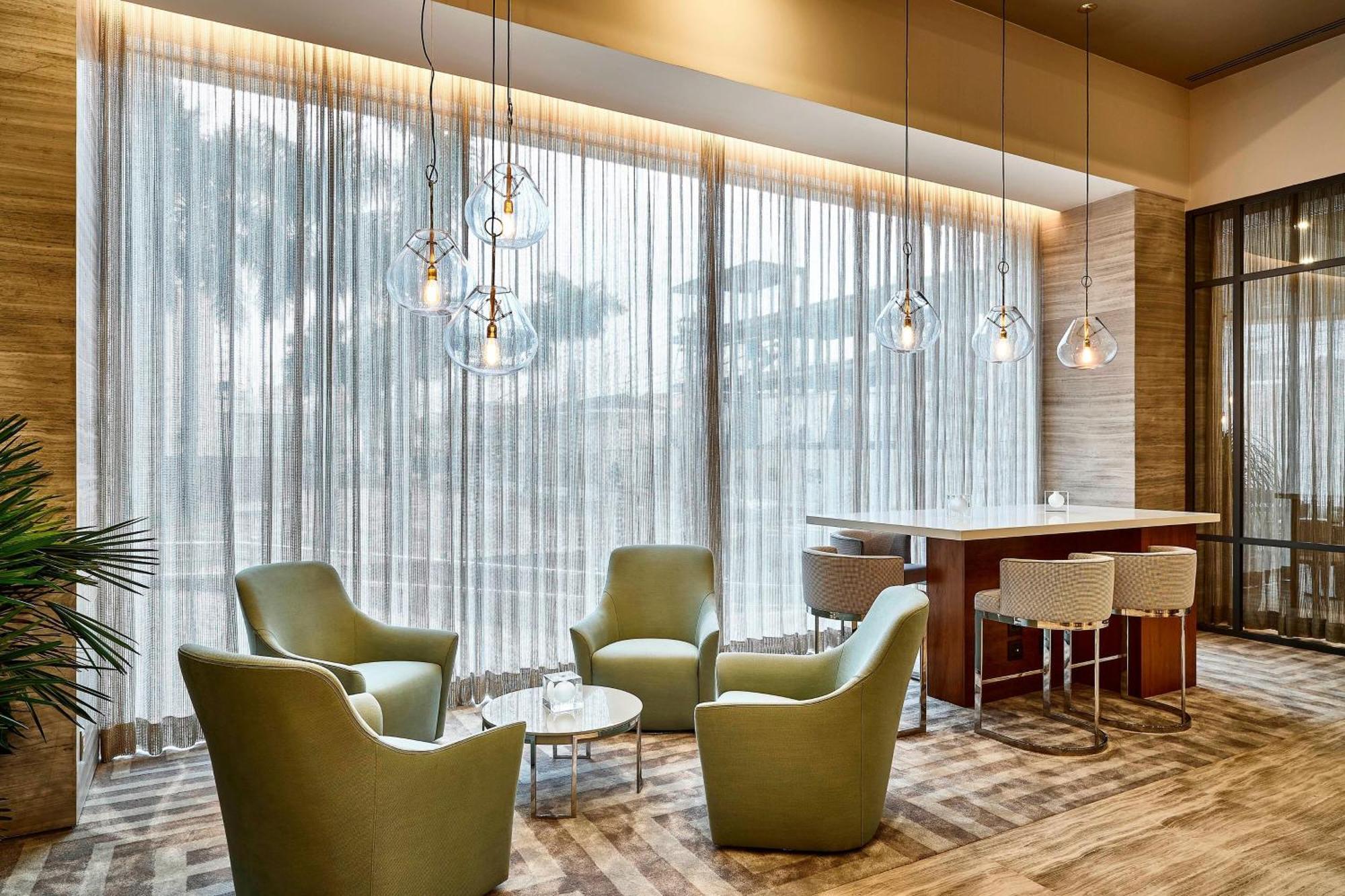 Sheraton Santos Hotel Екстер'єр фото The lounge at the airport